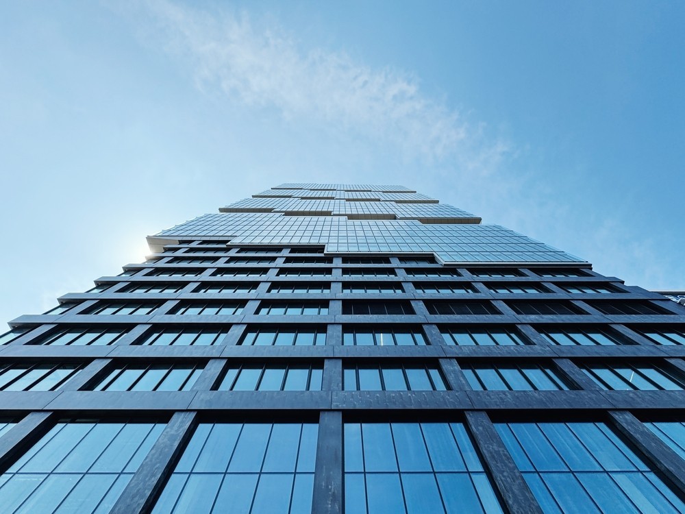 Looking up at a skyscraper in a city centre