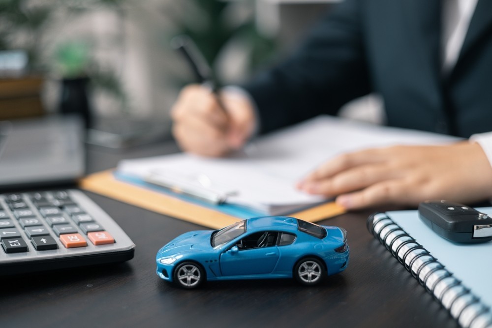 Photo of a toy car sat on a desk