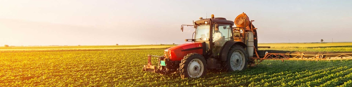 A photo of a tractor in a field