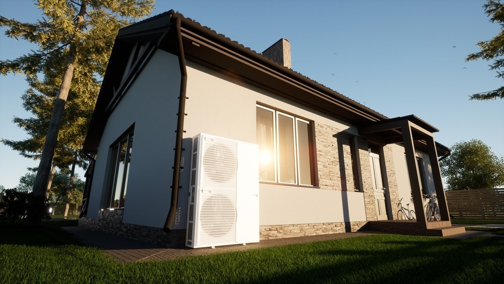 Photo of a heat pump in front of a building