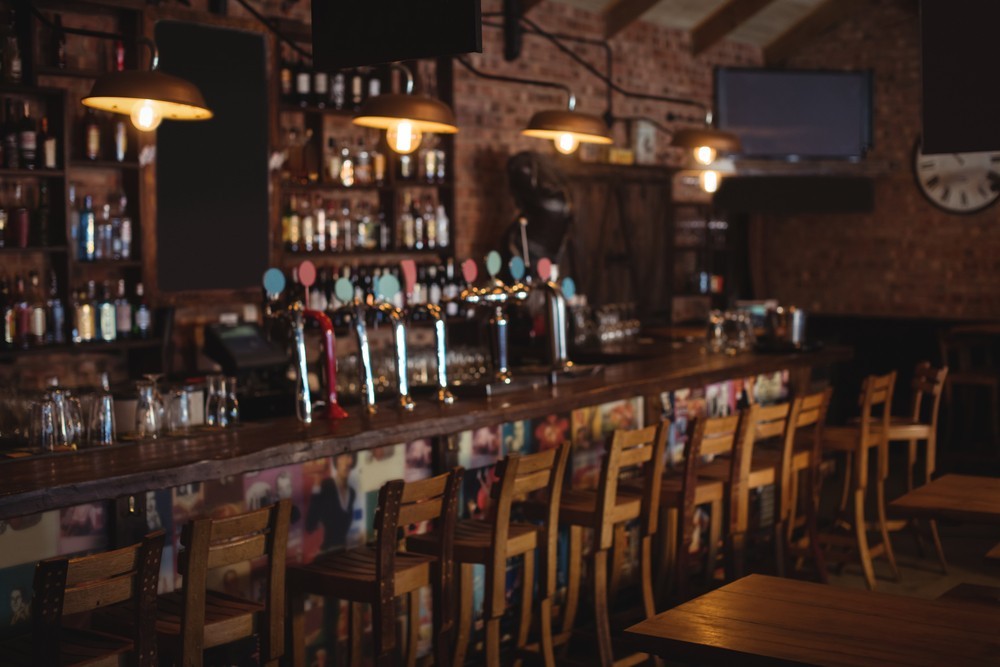 The wooden bar of a pub