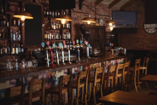The wooden bar of a pub