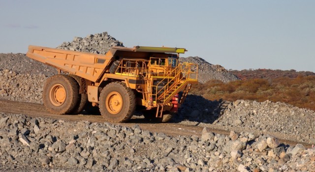 Dump Truck driving on a quarry site