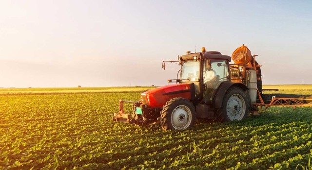 A photo of a tractor in a field