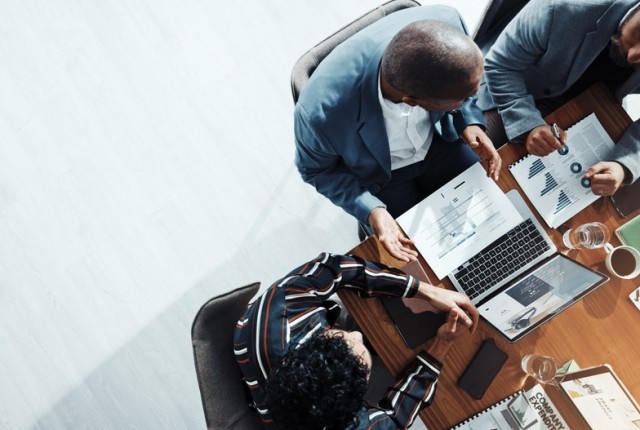 A group of business people having discussions in a meeting