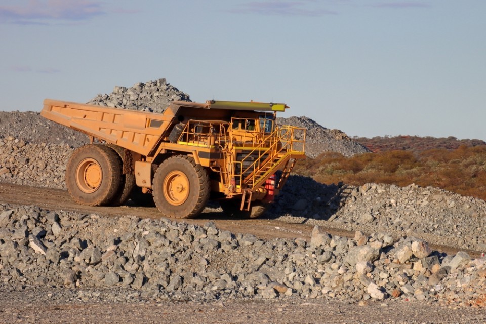 Dump Truck driving on a quarry site