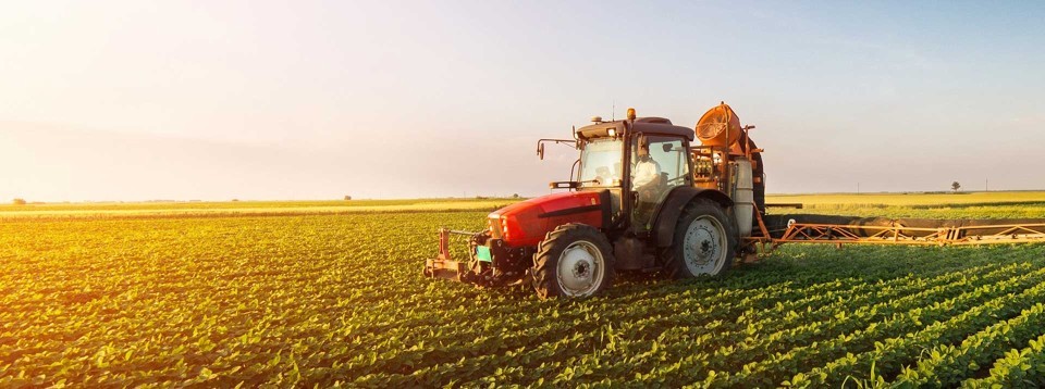 A photo of a tractor in a field